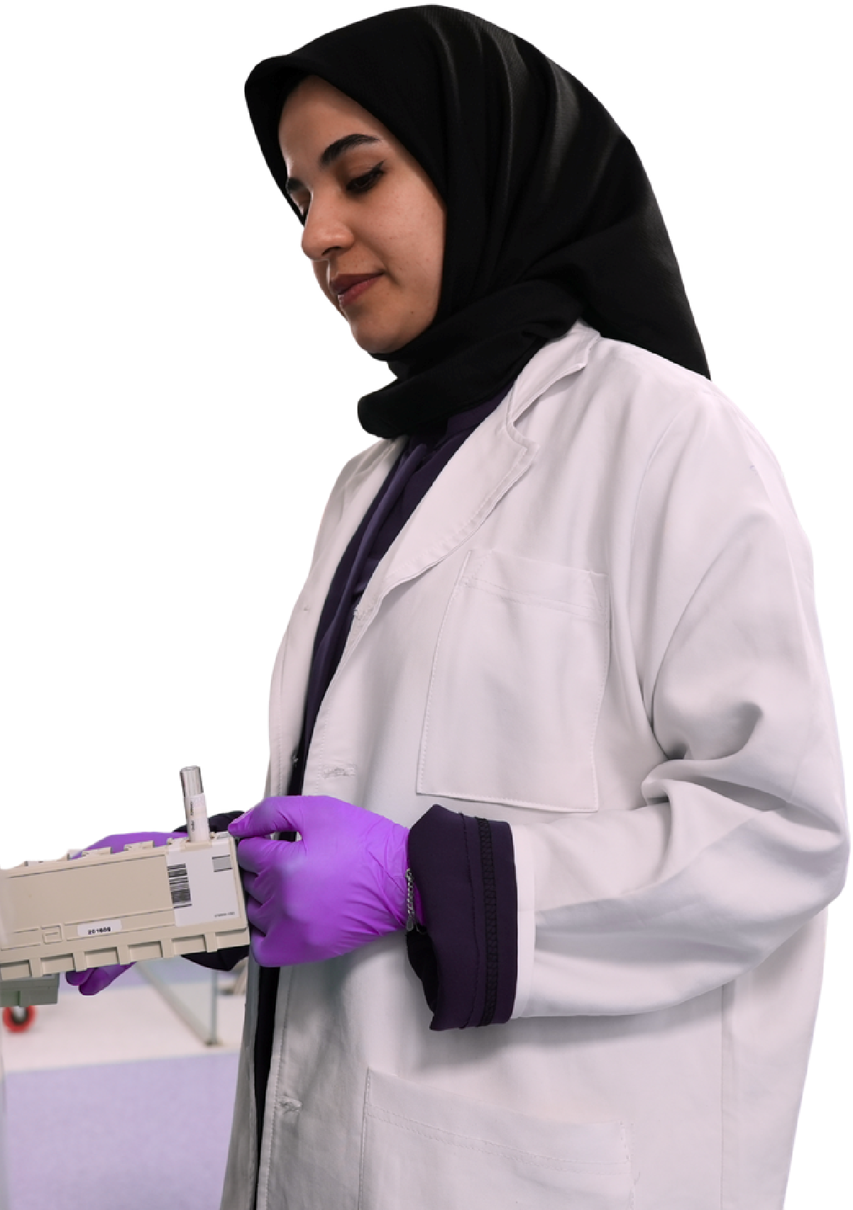 Scientist holding lab instrumentation